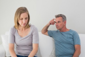 Unhappy couple not talking after an argument at home