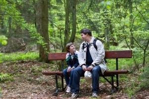 Father and son on a bench