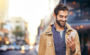 Cropped shot of a young man commuting through the city