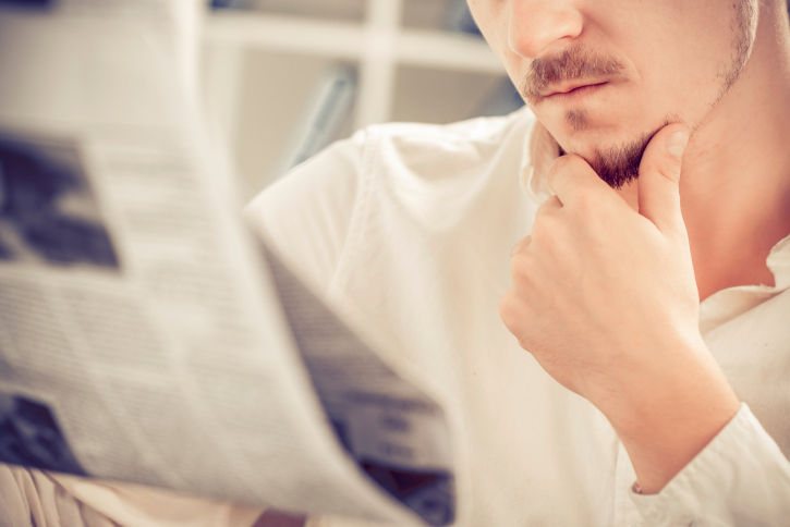 Man reading a newspaper