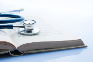 Stethoscope on top of book