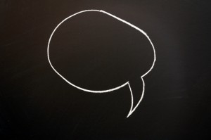 Empty speech bubble on chalkboard