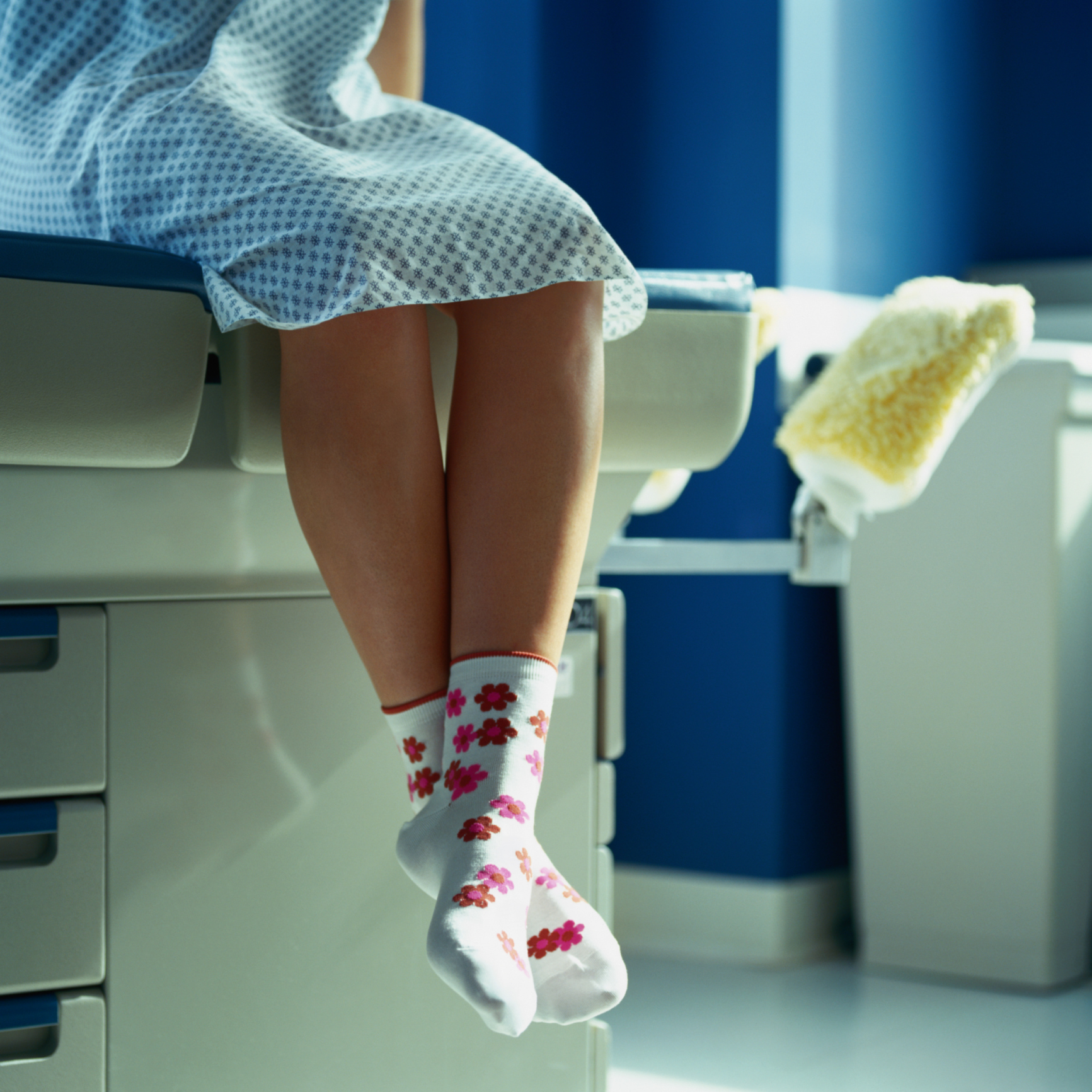 Patient sitting on an examination table