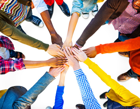 Hands of diverse group of people