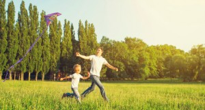 Father and son fly a kite