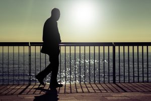 Blurred silhouette of a man walking