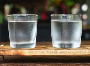 Two water glasses side by side
