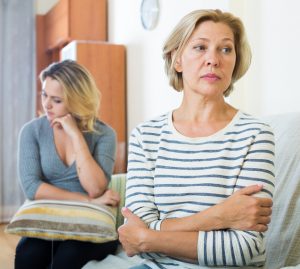 Disagreement between middle-aged woman and adult daughter