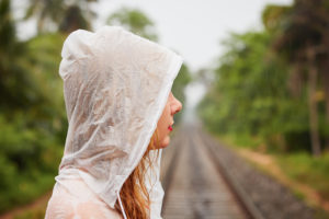 Woman in heavy rain