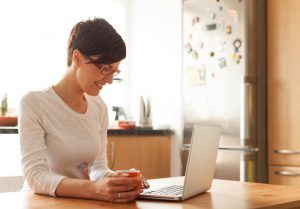 Young person with professional appearance uses video chat at home