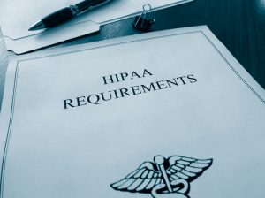 HIPAA requirements file on a desk