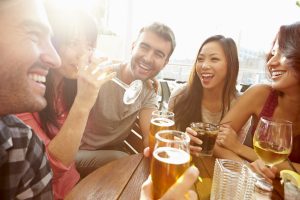 Friends hanging out at rooftop bar