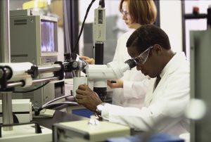 Researchers experimenting in a lab