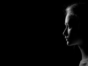 face profile in black and white silhouette