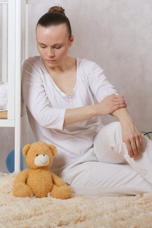 Woman with postpartum stress