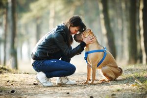 Woman on a walk with her dog