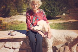 Older woman with service dog