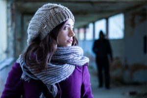 person being stalked in parking garage