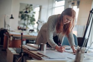 Woman working on a project at work