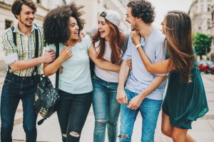 Teens laughing and walking together