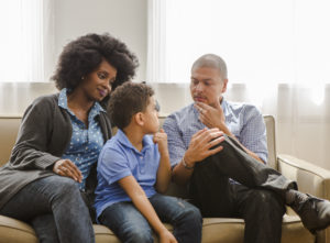 Parents having a serious discussion with their child