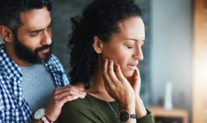 Shot of partner comforting partner who isn't feeling well