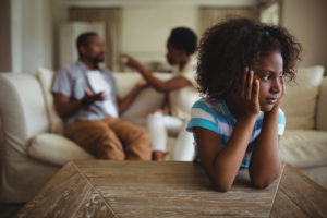 Child in front of parents arguing