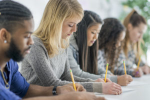 A group of students take an IQ test.