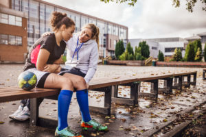 Teen athlete gets support from coach