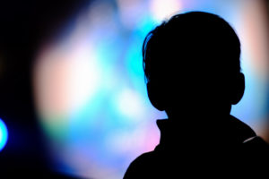 Boy's silhouette against colors