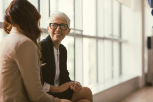 Two professionals talking during clinical supervision