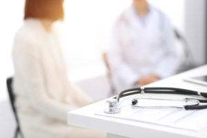Therapist talking with a doctor