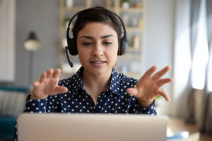 Woman giving online therapy