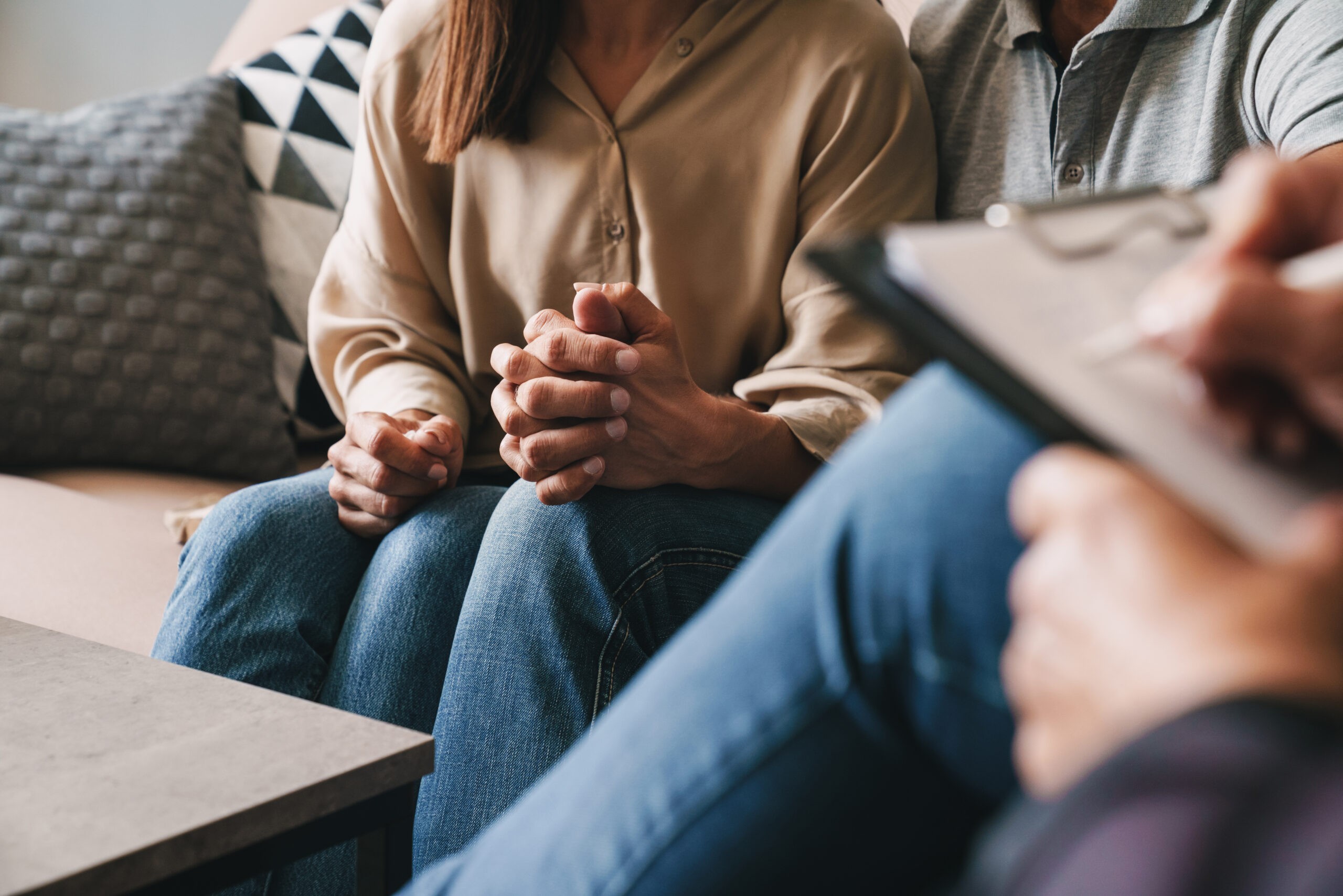 Health Sense Couple holding hands while in couples therapy