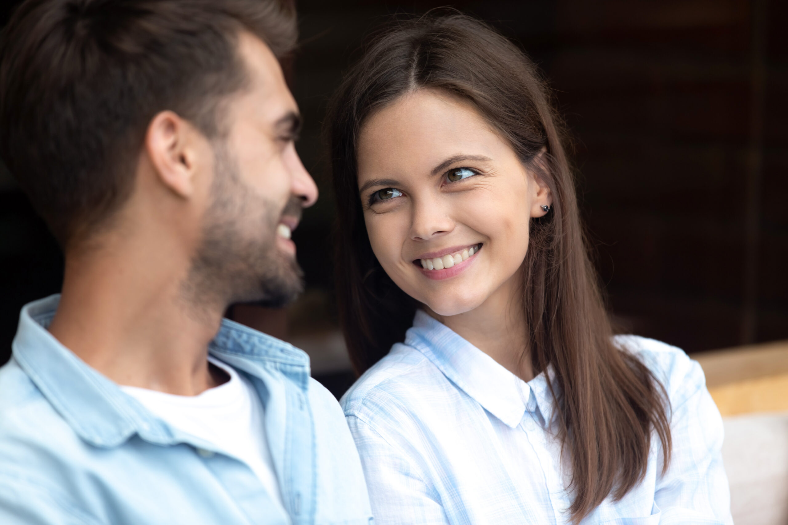 Young couple smiling and looking at each other 
