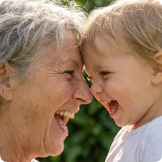 A couple shares a cozy moment on a rust-colored couch, illustrating the harmony of interpersonal neurobiology. The woman reads, the man solves a crossword, and a cat sleeps peacefully below.
