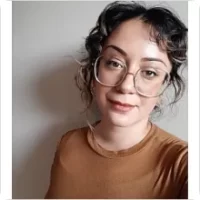 How Feeling Safe Heals Your Brain: 5 Ways Interpersonal Neurobiology Explains It 4 azin heydari, registered Psychotherapist, specializing in Interpersonal Neurobiology, wearing glasses, in a friendly headshot portrait.