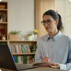 Mental health professional earning CE credits online using a laptop