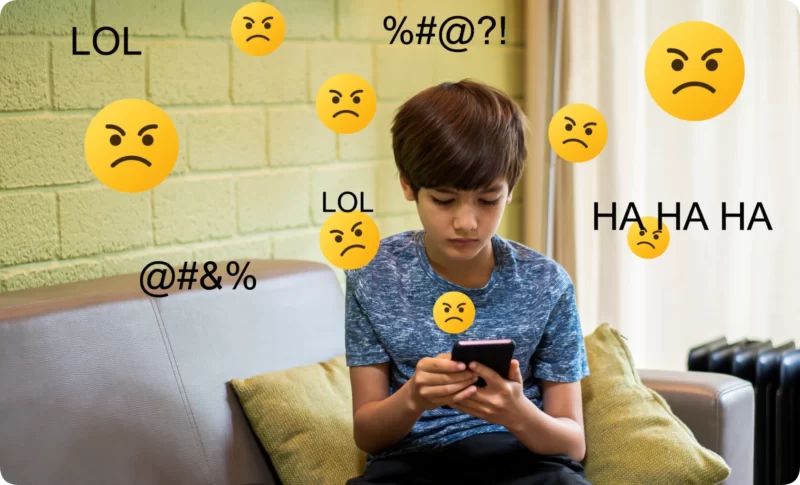 Teen boy on smartphone experiencing cyberbullying — when to seek teen therapy