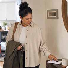 Featured image for identifying patterns article showing a person pausing before leaving home