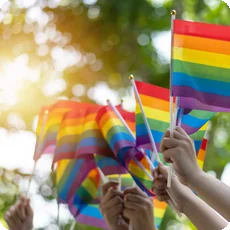 Rounded Pride flag image for an article about LGBTQ+ affirming therapy.