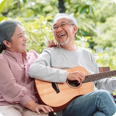 Rounded thumbnail of an older couple smiling together, reflecting senior years mental health and connection.
