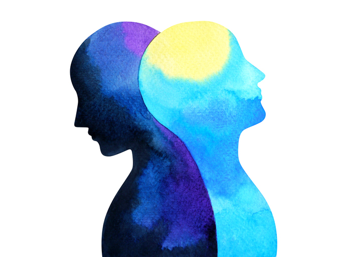 Illustration of two silhouettes facing opposite directions. One silhouette is blue and yellow, the other is indigo and black.