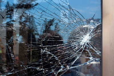 Window with web of broken glass
