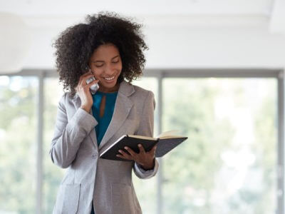 Therapist looks at daily planner.