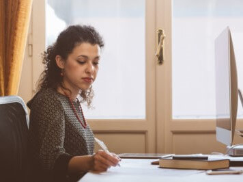 Therapist works alone in her home office