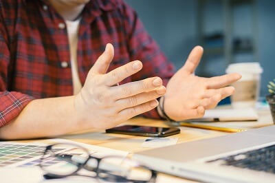 Motioning with hands while speaking