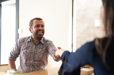 Shaking hands with therapist