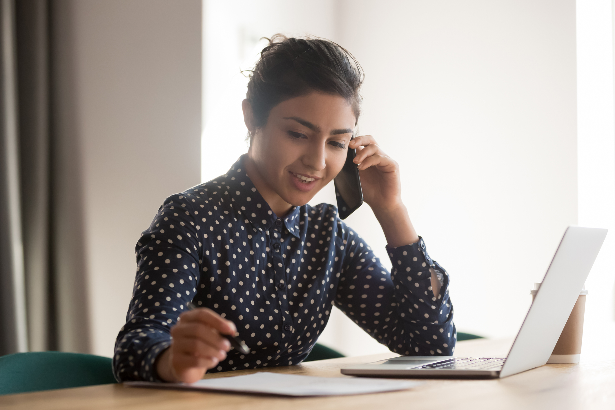 Virtual assistant taking a phone call. 