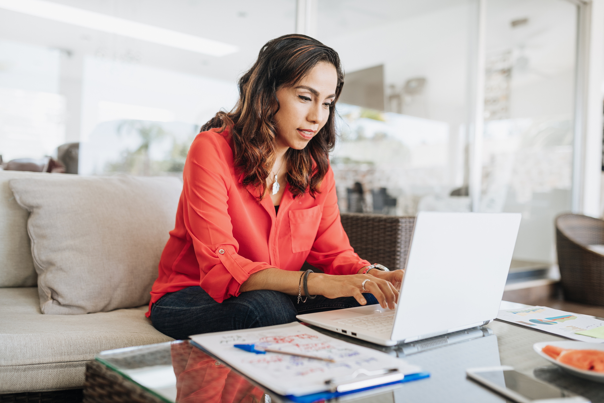 Female therapist creating a directory profile online.